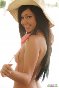 Catie Minx in peach bikini
