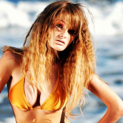 Faye Reagan in orange bikini top