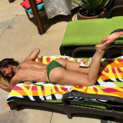 Charisma Carpenter in green bikini bottom