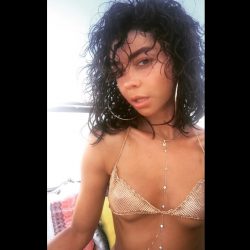 Sarah Hyland in tiny golden bikini