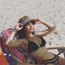 Martha Higareda in bikini at the beach